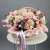 Композиция в корзине "Диодора" из французских роз Квиксенд, диантусов и кустовых пионовидных роз Бомбастик в Сергиевом Посаде